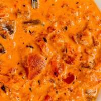 Tomato Soup · House Specialty - Fire roasted tomatoes, cream, mushrooms and smoked bacon