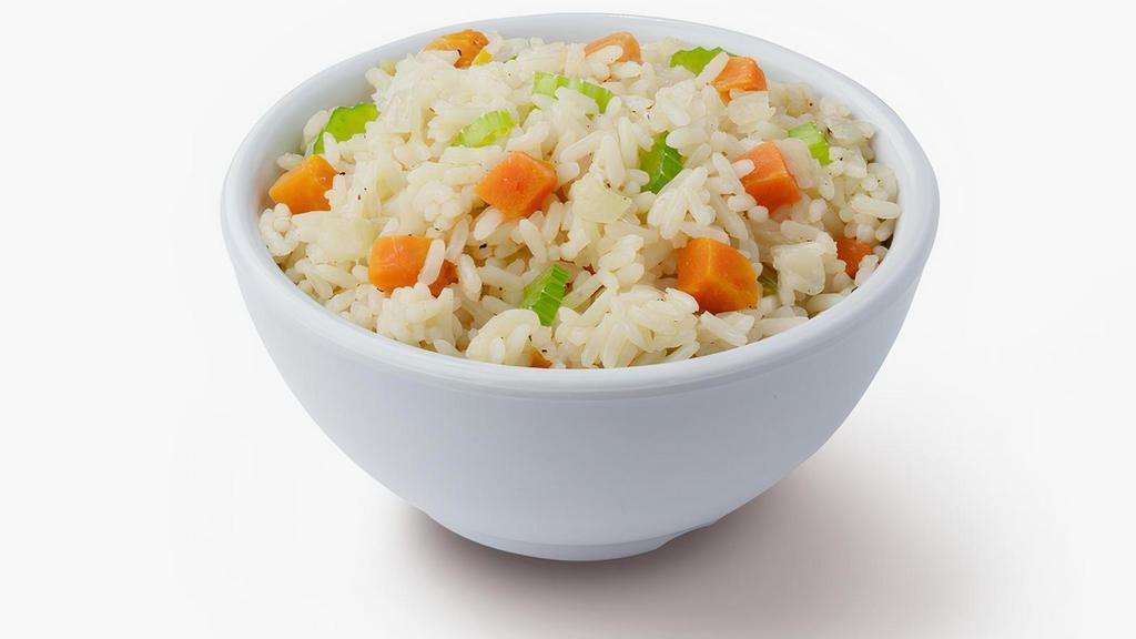 Rice Pilaf · Tender white rice with onions, carrots and celery; simply seasoned with salt, pepper and garlic butter.