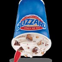 Reese'S Peanut Butter Cup Blizzard Treat · REESE'S Peanut Butter Cups blended with creamy DQ vanilla soft serve to BLIZZARD perfection