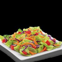 Side Salad · Fresh lettuce topped with diced tomatoes and shredded carrots and cabbage. Available with yo...