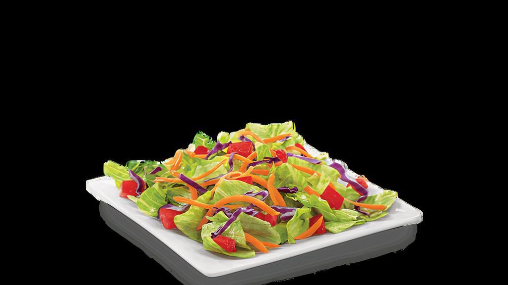 Side Salad · Fresh lettuce topped with diced tomatoes and shredded carrots and cabbage. Available with your choice of dressing