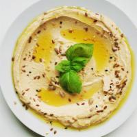 Hummus Tahini Dip · Vegetarian. Traditional chickpea, garlic + tahini puree, served with pita or carrots.