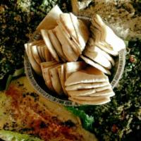 Mezza For 4 · Falafel, dolmeh (stuffed grape leaves), baba ganoush, tabouli, hummus + persian salad, serve...