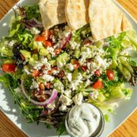Greek Salad · Vegetarian. Lettuce, cucumber, tomato, onion, olives + feta cheese, served with tzatziki sau...