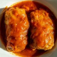 Cabbage Roll Entrees · Cabbage leaves stuffed with basmati rice, beef & simmered in tomato sauce. All entrees are s...