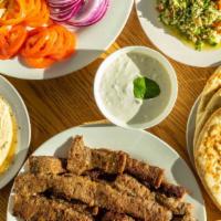 Take Home Pack Plus · Create your own gyros or falafel sandwiches at home. Includes falafels, 4 pitas, vegetables,...