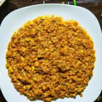 Egg Curry · Shredded boiled eggs cooked in a garlic-tomato based gravy AKA Surati Kheemo