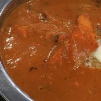 Butter Chicken · Cooked with butter, cream and lite spices.