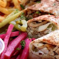 Chicken Shawarma Q · Chicken shawarma wrap arabic style, served with French fries, pickles, and garlic sauce.
