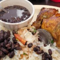 Dinner Special (1/2) · Half south American rotisserie chicken with two side orders.