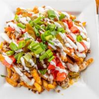 Chorizo Cheese Fries · French fries topped with chorizo, muenster, and cheddar cheeses, jalapeños, tomatoes, scalli...