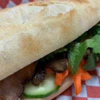 Banh Mi Sandwich · All comes with: Choice of protein, cucumber, jalapeño, pickled carrot, cilantro, onion paste...
