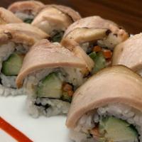 Porkbelly Banh Mi Sushi Roll · inside: cucumber, pickled carrot, jalapeño, cilantro, sesame paste, mayo
outside: pork belly...