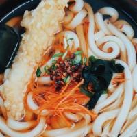 Half Udon Noodle Soup · Half size noodle soup
comes with wakame seaweed, carrot, green onion, chili peppers, tempura...