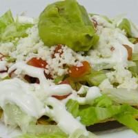 Tostadas · Your choice of meat,  beans,  lettuce,  tomatoes, lettuce, sour cream and guacamole