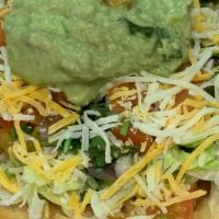 Chalupa · Fried flour tortilla with your choice of meat, beans, lettuce, tomato, cheddar cheese, sour ...
