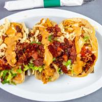 Mystery Tacos · If you know - you know. If you don't you should try. All we'll say is meat is chicken, and i...