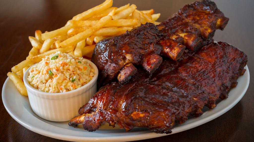 Bbq Ribs (Whole Slab) · Fall off the bone, smoky, tender and juicy ribs our house, sweet and tangy BBQ sauce.. You won't be able to stop at just one.