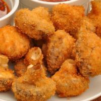 Fried Mushrooms · Whole button mushrooms lightly breaded and deep fried make an irresistible snack.