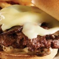 Mushroom Swiss Burger · Flame-grilled 1/3 lb burger topped with sauteed mushrooms, swiss cheese and garlic mayo on a...