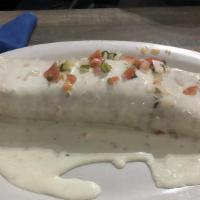 Burrito Jalisco · Burrito stuffed with grilled chicken, rice, beans, and chorizo. Covered with cheese dip then...