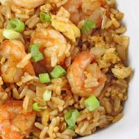 Shrimp Fried Rice · Shrimp, prepared steamed white rice with soy sauce, eggs, peas, carrots and green onions.