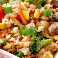 Vegetable Fried Rice · Vegetable, prepared steamed white rice with soy sauce, eggs, peas, carrots and green onions....