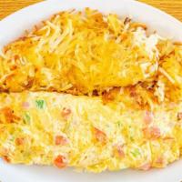 Western Omelette · Green peppers, onions, tomatoes, ham and cheese.