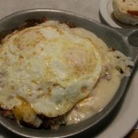 Biscuit & Gravy Skillet · Open-faced biscuit, sausage patties, topped with our famous sausage gravy. No toast or panca...