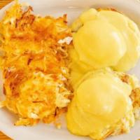 Eggs Benedict · Two poached eggs and Canadian bacon on an English muffin, topped with hollandaise sauce. No ...