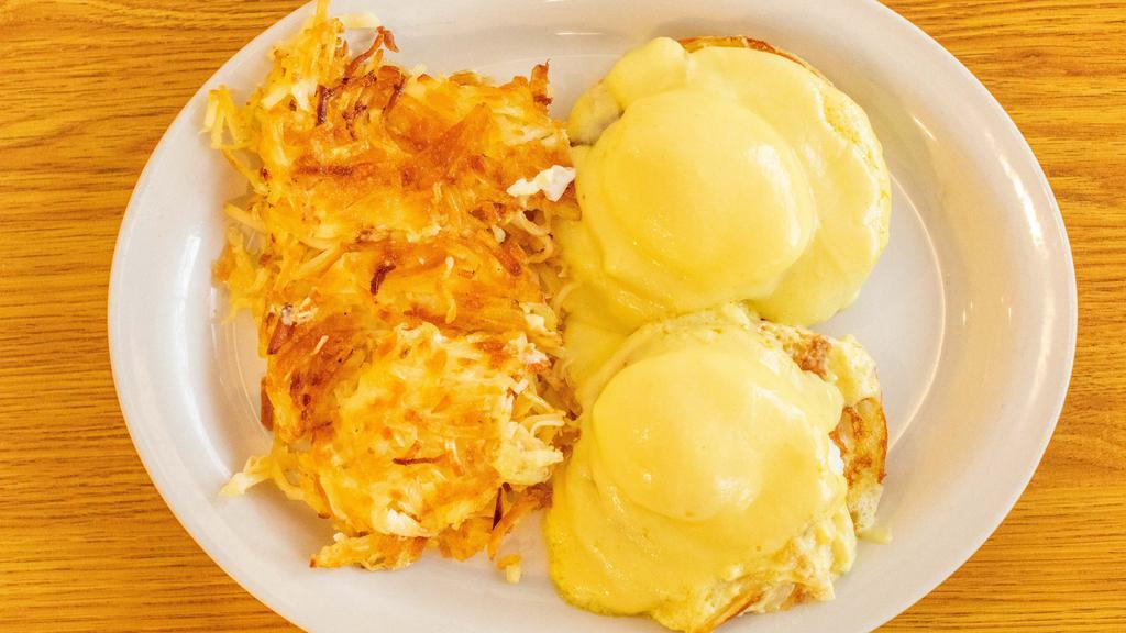 Eggs Benedict · Two poached eggs and Canadian bacon on an English muffin, topped with hollandaise sauce. No toast or pancakes.