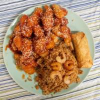 Sesame Chicken · Includes Egg roll & Shrimp Fried Rice.