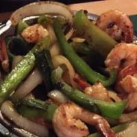 Shrimp Fajita · Grilled shrimp with onions and bell peppers sizzled on a skillet, served with rice, sour cre...