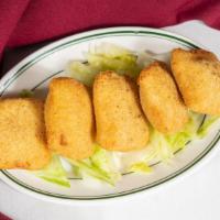 Paneer Pakora (5) · Pieces of homemade cheese, dripped in chick-pea batter and deep fried.