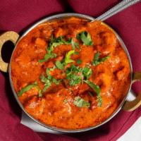 Chicken Tikka Masala · Boneless chicken breast marinated in yogurt and spices, roasted on the skewer sauteed in tom...