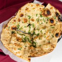 Garlic Naan · Naan bread with fresh garlic, cilantro and seasoning.