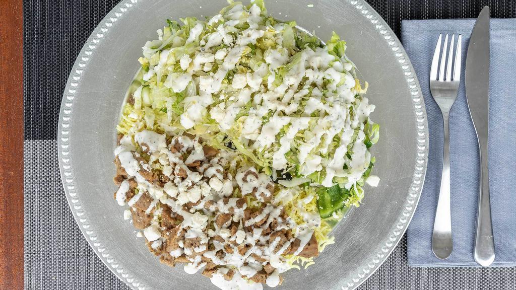 Gyro Plate · Rice, hummus, side salad.