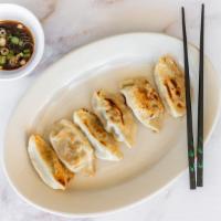 Pan Seared Korean Dumplings · house ginger soy dipping sauce