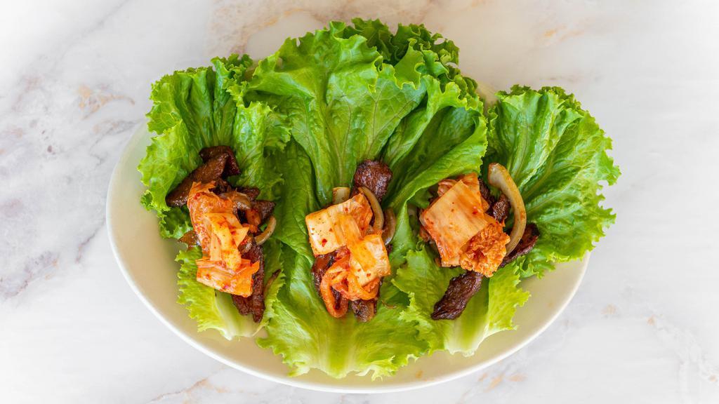 Korean Beef Lettuce Wraps · marinated beef, served with kimchi