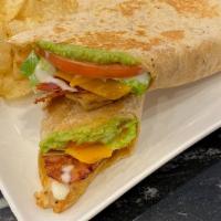 Chicken Bacon Ranch Wrap · Grilled chicken, bacon, cheddar cheese, lettuce, tomatoes, avocado, ranch, rolled and presse...