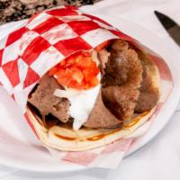 Gyros · Served on a 6 - inch pita, thinly sliced unique recipe gyros off the spit piled high with on...