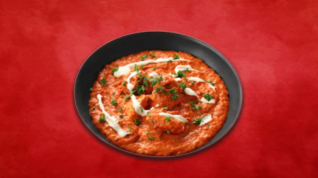 Brisk Butter Paneer · Cooked in creamy tomato based sauce with spices, herbs, cream and butter. Served with a side of rice.