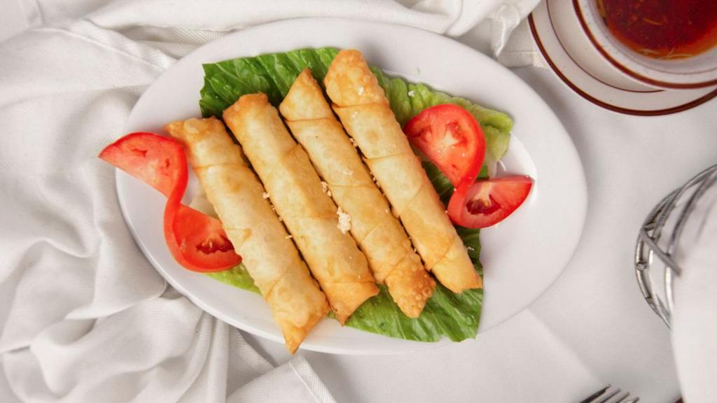 Sigara Borek · Vegetarian. Hot flaky phyllo pastries filled with feta cheese, fresh dill and parsley.