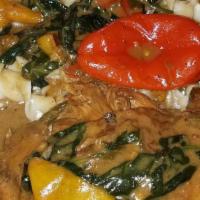 Coco Lily Chicken · Medium Spicy Coconut Currie Jerk Chicken cooked with Assorted Colorful Peppers, Veggies and ...