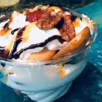 Ms Shea'S Banana Pudding Delight  · There's a secret in every layer, topped with Caramel Chocolate, Strawberries, Pineapples & P...