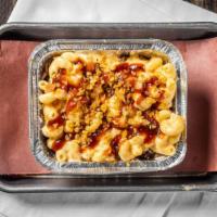 Bbq Mac · Pulled pork with sweet BBQ sauce topped with mac and cheese and bread crumbs