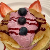 Loaded Pancakes · Banana, strawberry & blueberry.