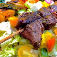 Low Carb Salad · House Salad Topped with Lamb, Beef or Chicken.