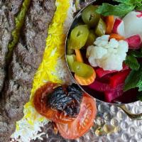 Koobideh With Saffron Rice · With Beef or Lamb, Grilled Tomato.