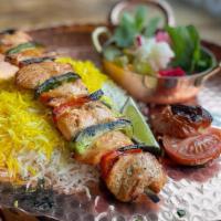 Fish Kebabs · Glutten Free. Salmon with Saffron Rice and Grilled Tomato.